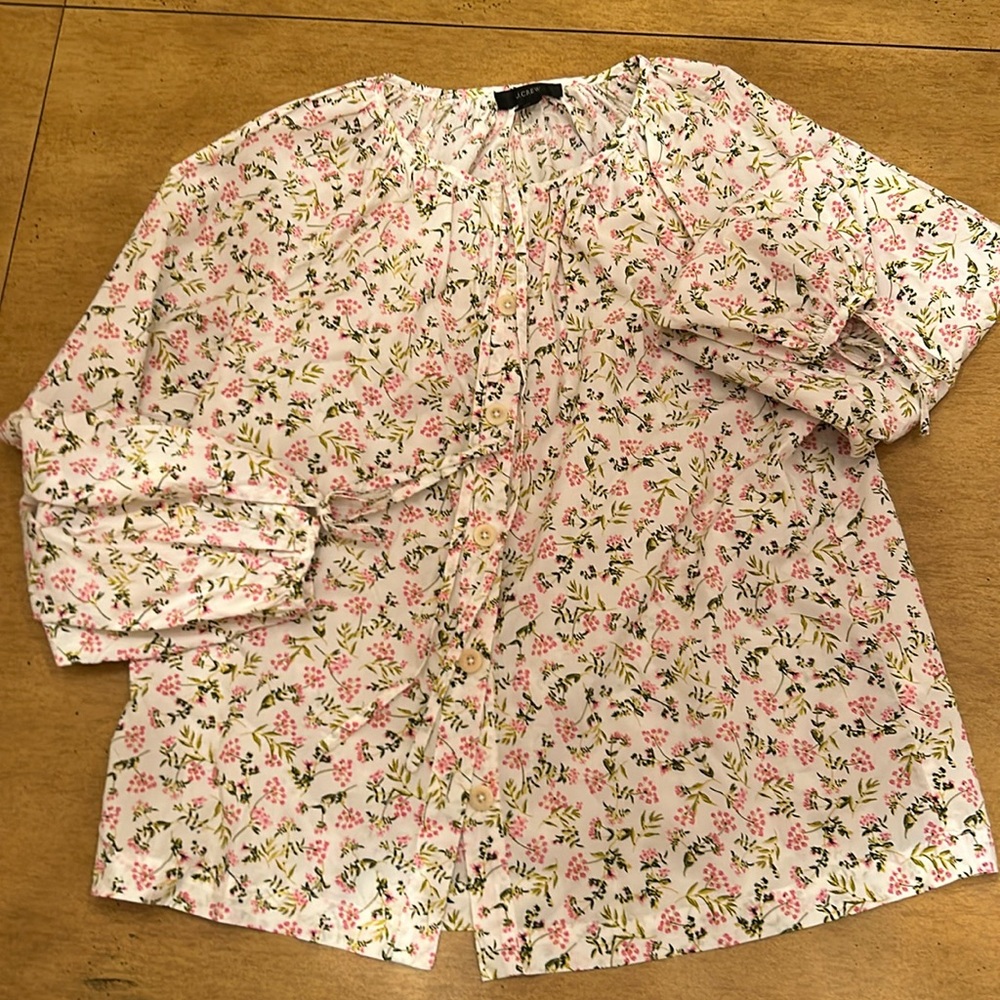 J. Crew floral button up shirt with flowy sleeves.